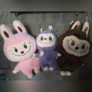 Labubu Pink, Purple Dinosour, and Brown Plushies!